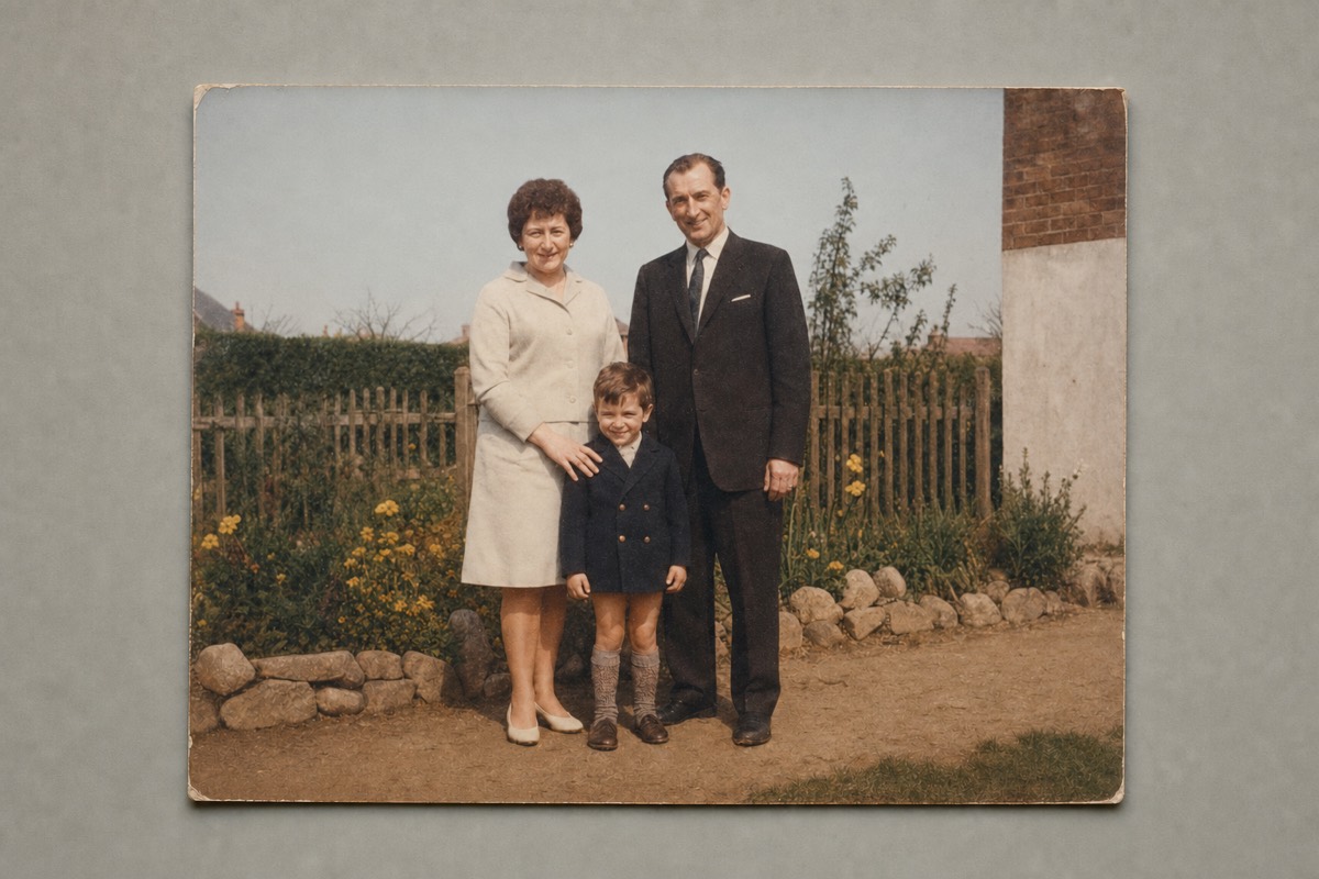 The same photograph repaired, the crease gone and the colour neutral